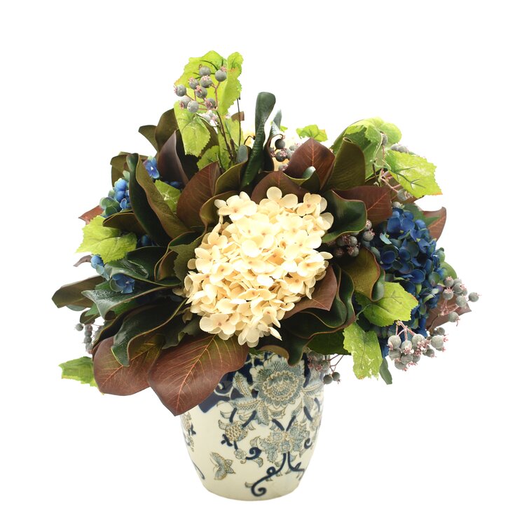 Assorted Hydrangea Magnolia and Berries in Vase